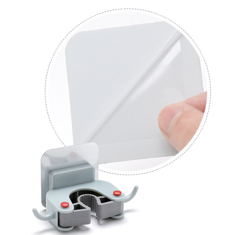 Nail-free multi-function traceless mop holder receives mop hook