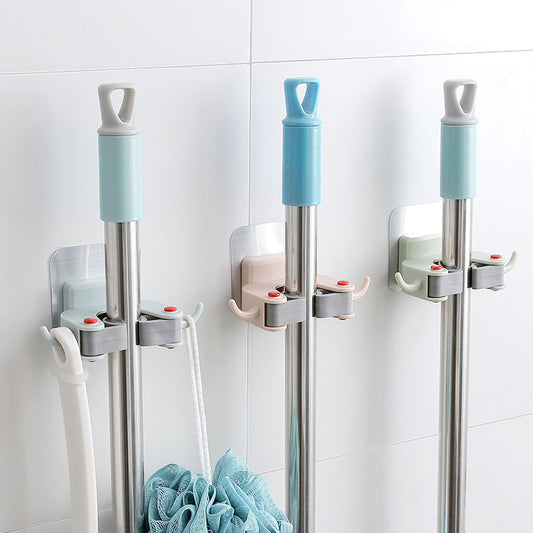 Nail-free multi-function traceless mop holder receives mop hook