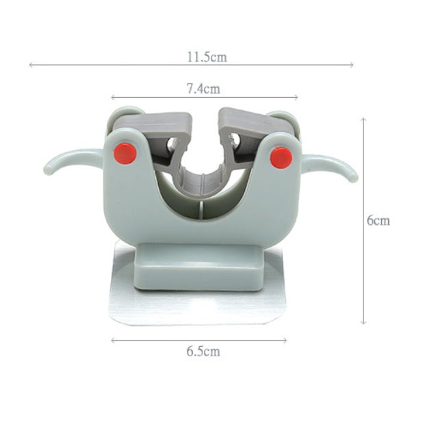 Nail-free multi-function traceless mop holder receives mop hook