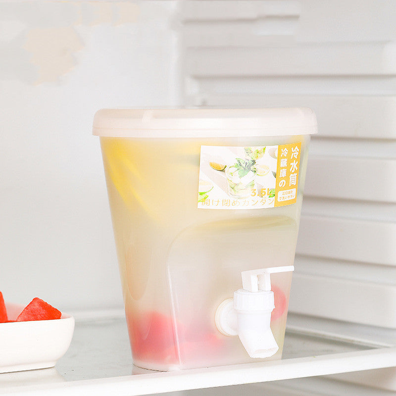 Cold Water Bucket With Faucet Placed In The Refrigerator